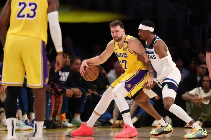 Jaden McDaniels Appears To Intentionally Trip Luka Doncic; Gets Ripped By Lakers Fans